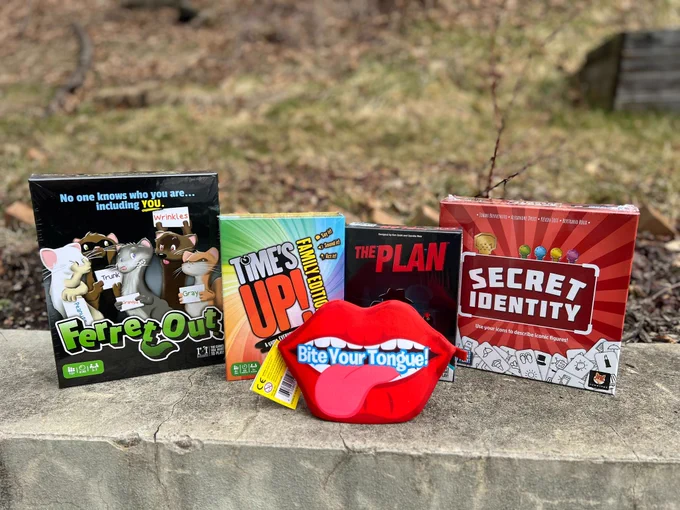 Ferret Out, Times Up! family edition, The Plan, Secret Identity and Bite Your Tongue game boxes 