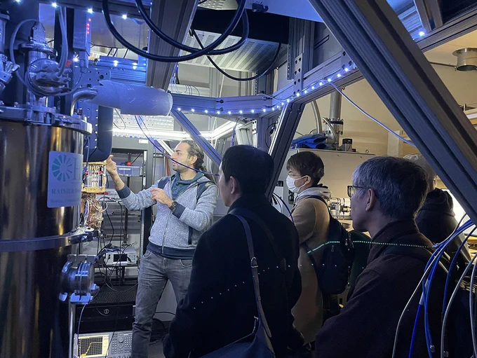 Kasra Nowrouzi took the visitors on a tour of the Advanced Quantum Testbed.