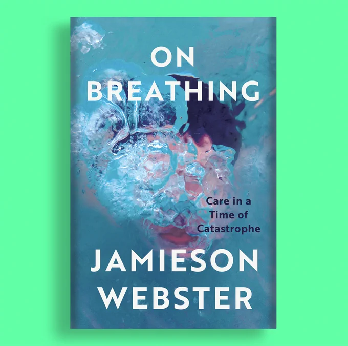 A mockup of the book On Breathing by Jamieson Webster. Cover features a painting of a face blowing a field of obscuring bubbles underwater.