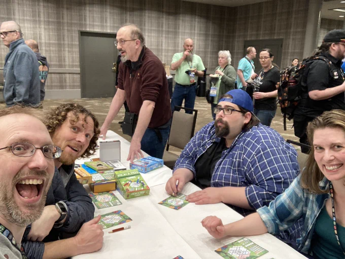 Shawn playing a game with happy folks