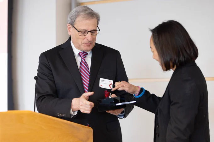 BU Interim Provost Kenneth Lutchen and MA Secretary of Economic Development Yvonne Hao commence the robotic ribbon cutting for RASTIC on the BU campus. Photo courtesy of Mike Spencer Photography