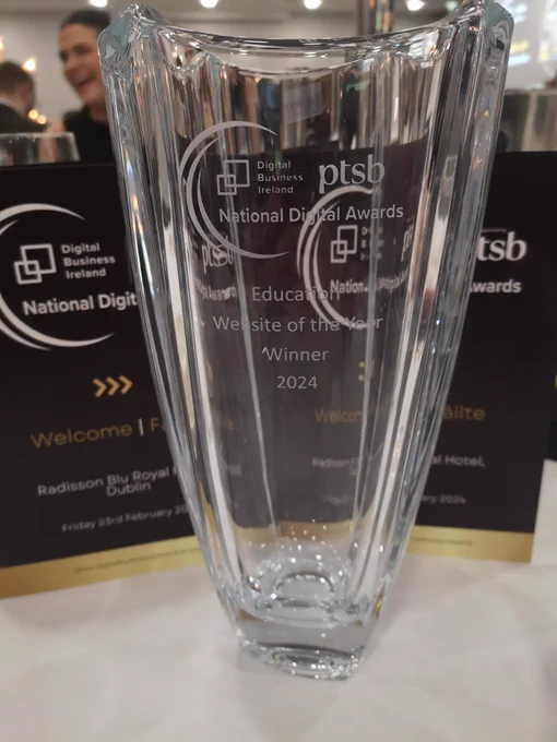 The award for best education website at the National Digital Awards is a large glass trophy. 