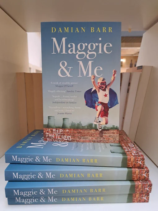 Five copies of Maggie & Me on a bookshelf