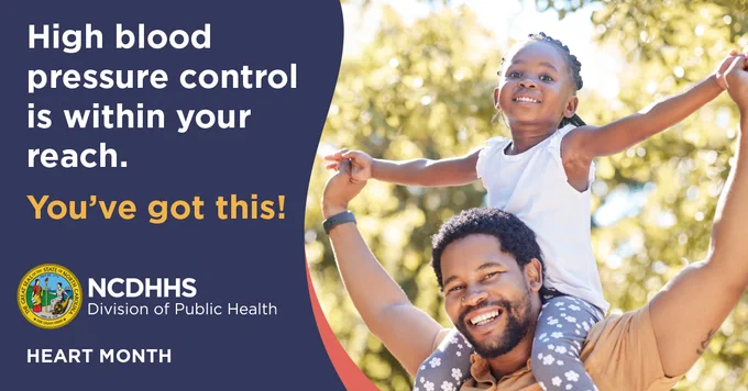 A young girl sits on the shoulder of her father. The slogan “high blood pressure control is within your reach” is displayed to the left of the pair.