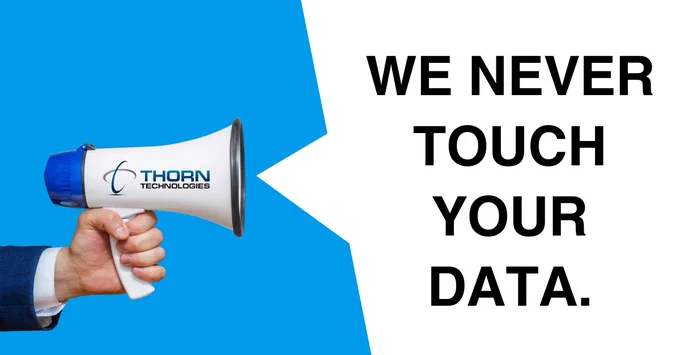 A man holding a megaphone and text that says, "We never touch your data."