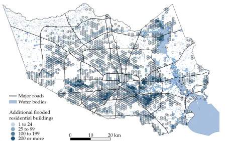 A map of the City of Houston showing buildings that would not have been flooded by Hurricane Harvey due to the additional impact of climate change. There are particularly dense clumps in the southeast and western part of the city