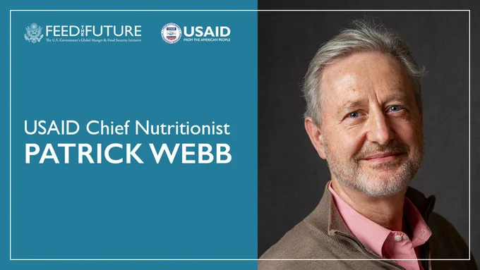 A professional headshot of Patrick Webb with the text USAID Chief Nutritionist Patrick Webb.