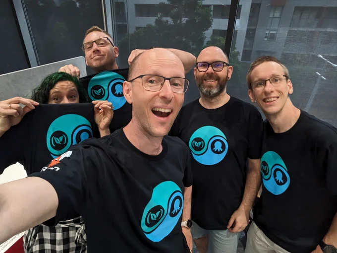 A photo of excited Octonauts wearing company t-shirts