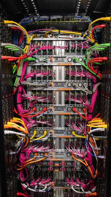 Beautiful cabling done by our Groqsters at the datacenter. The back of the LPU™ Inference Engine.