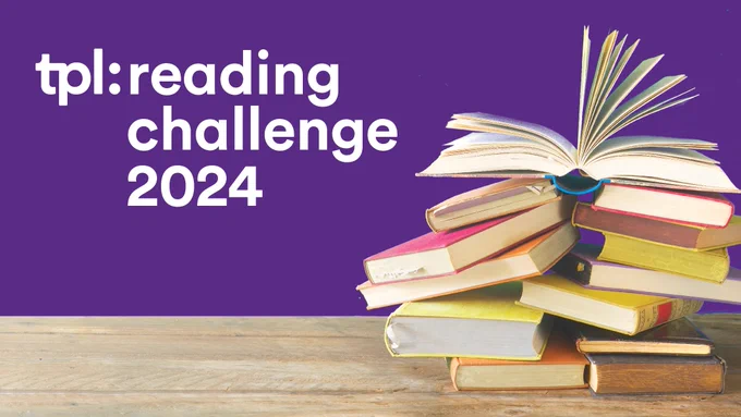 An uneven stack of books is on a wooden table. White text says "tpl reading challenge 2024" over a purple background.
