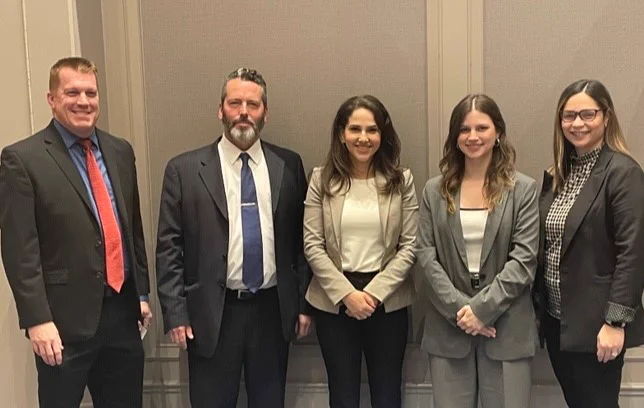 A photo of the IMPACT Conference panelists. 