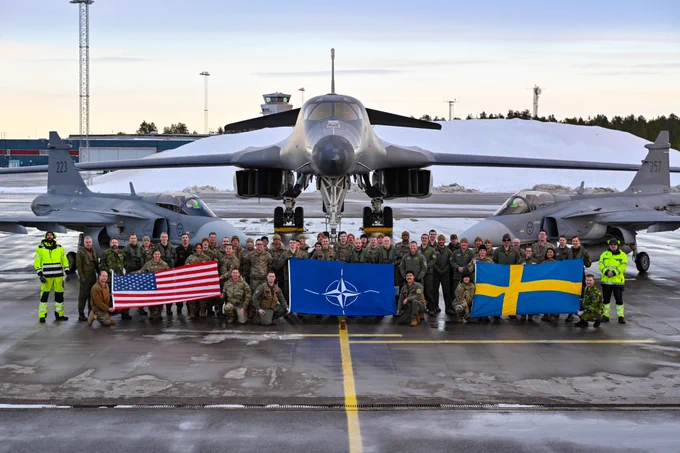 U.S. Air Force Airmen assigned to the 28th Bomb Wing, Ellsworth Air Force Base, South Dakota, pose for a group photo alongside Swedish military personnel in front of a B-1B Lancer and two Saab JAS 39 Gripens at Luleå-Kallax Air Base, Sweden, Feb. 26, 2024, during Bomber Task Force 24-2. These BTF missions are representative of the U.S.' extended deterrent commitment to its Allies and partners and enhance regional security. BTF operations provide U.S. leaders with strategic options to assure Allies and partners, while deterring potential adversary aggression across the globe. (U.S. Air Force photo by Staff Sgt. Jake Jacobsen)