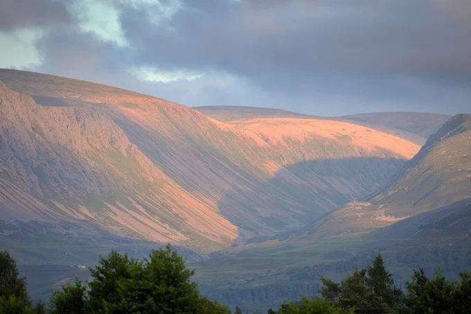 The mountain pass of Lairig Ghru in the dappled sunlight in Cairngorms National Park. Copyright NatureScot/Lorne Gill