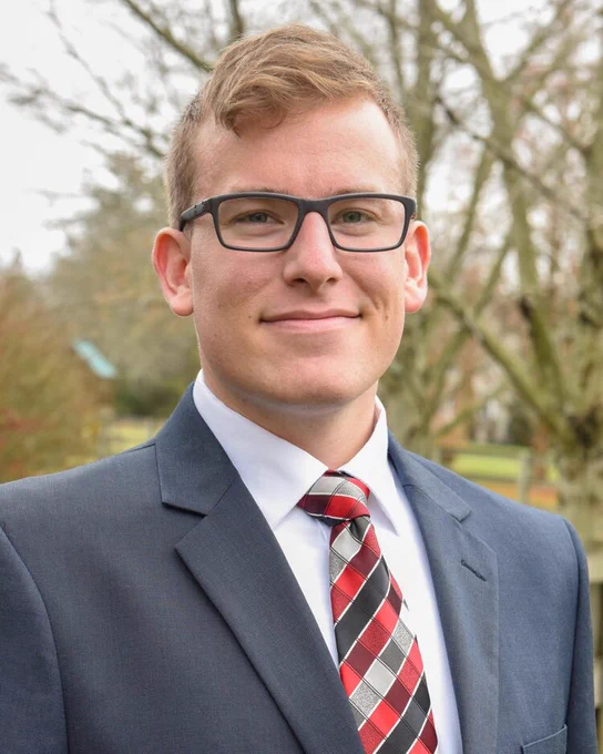 head and shoulders photograph of Michigan State University doctoral student Doug Guzior