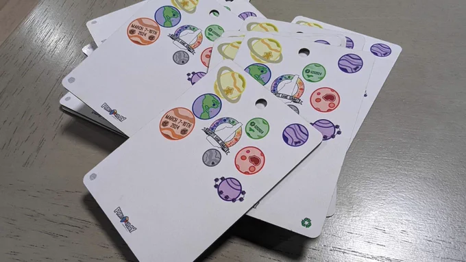 Badges for #G2S2024 with colorful planets 