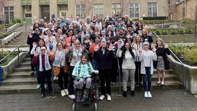 group photo in front of Mac Hall at OHSU in honor of Rare Disease Day (Feb 29)