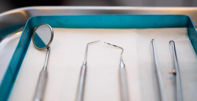 Photograph of a tray containing dental equipment