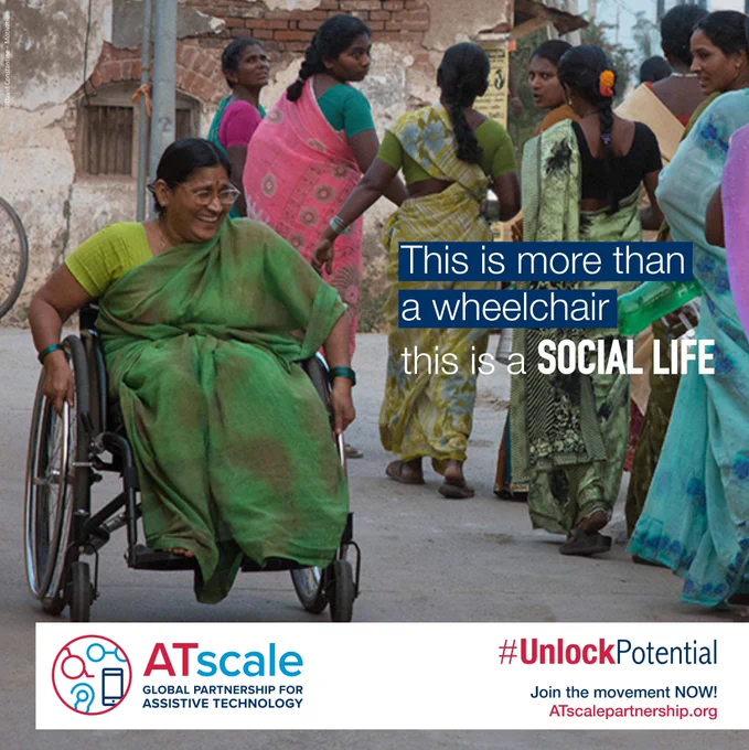 Tile reads: This is more than a wheelchair, this is a social life. A woman is pictured in her wheelchair moving down the street.