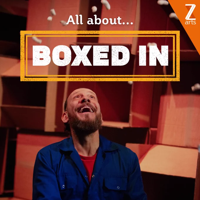 Daryl, a white man wearing a blue overalls looks up smiling. There is text that says: All about... Boxed In