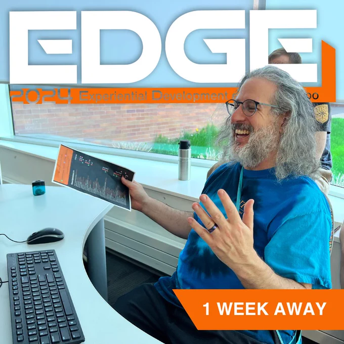 Director Dave laughing enjoying the game he playtested at last year's Expo