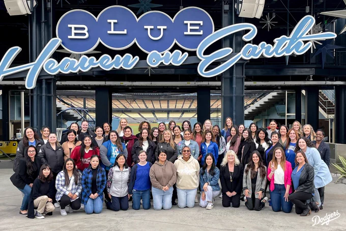 A photo of the women in the Dodger front office posing in Centerfield Plaza.
