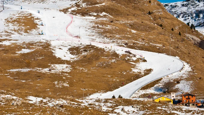 Skiing hill with minimal snow