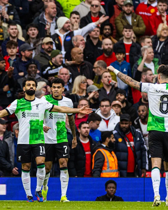 Mo Salah celebrates after scoring against Manchester United.
