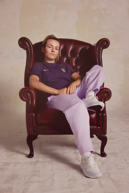 Lauren Hemp poses for a photo in the new England away shirt.