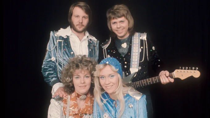 ABBA wearing satin sparkly outfits