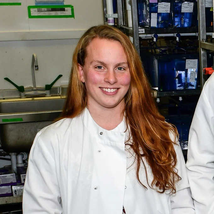 Image of Charli in proper lab attire.