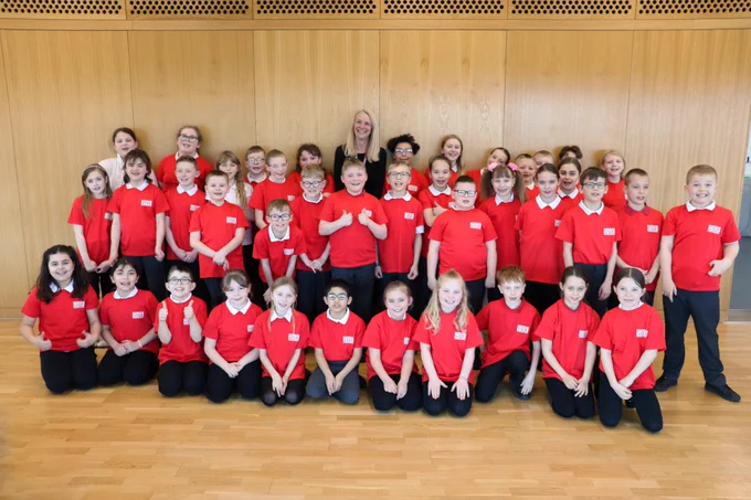 Students from Laithes Primary School and Jo Stokes from As Creatives at Library @ the Lightbox