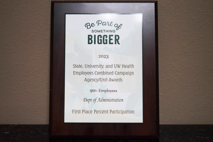 Plaque of the Partners in Giving award presented to DOA for first place in percent participation for an agency with over 900 employees.
