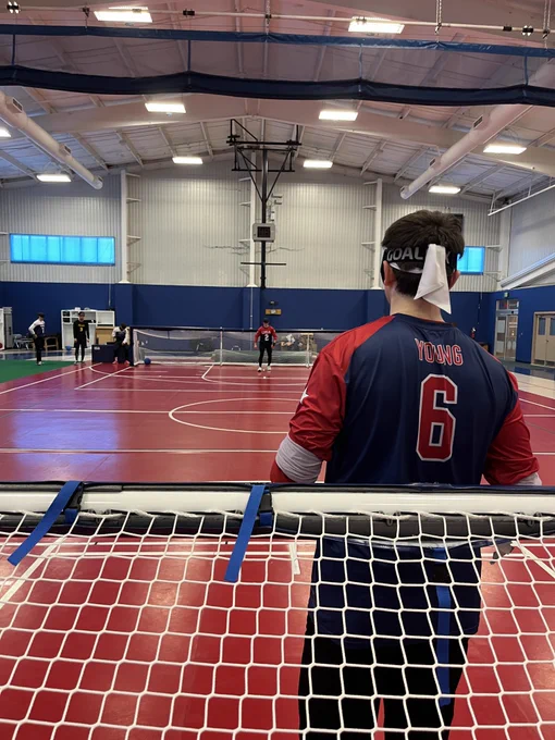A photo from behind the goal as Calahan Young prepares to take a penalty shot against Tyler Merren.
