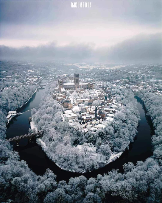 An aerial photo of the centre of Durham city on a snowy winter day. A river encircles the centre containing a Castle and Cathedral.

Photo courtesy of RJX Media.