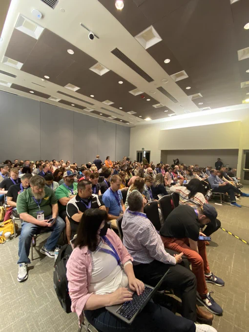 Image of the audience sitting in the room.