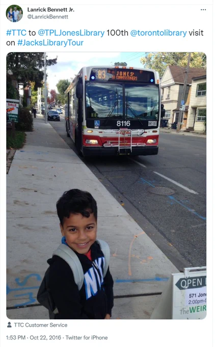 5 year old Jackson waiting for the bus to go to the library