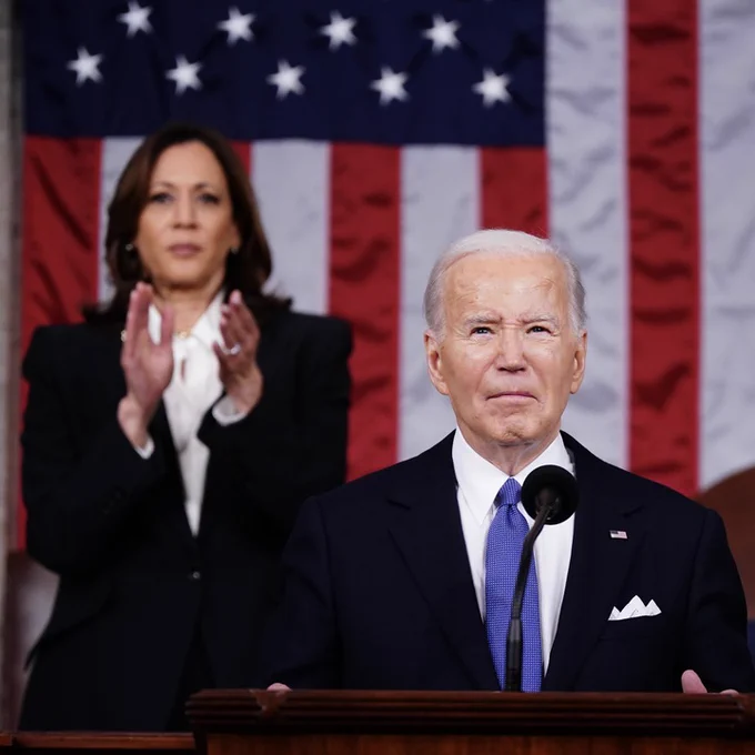 A photo of President Biden delivering his State of the Union address at the U.S. Capitol, with Vice President Kamala Harris behind him.