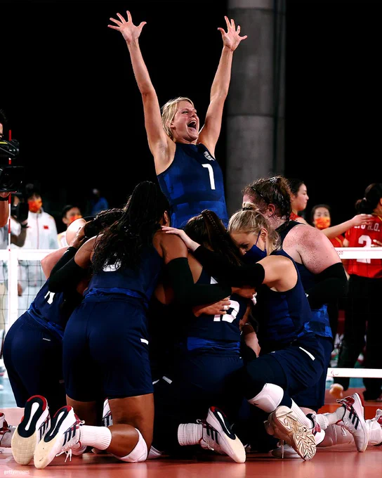 Team United States celebrate victory after winning the Women's Sitting Volleyball gold match