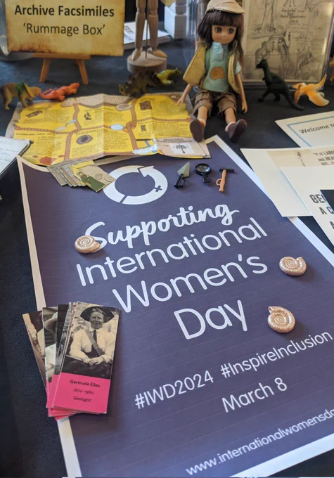 Supporting International Women's Day with Lottie the fossil hunter in the background