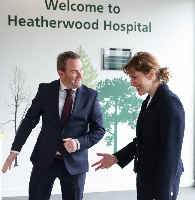 CEO Neil Dardis with Health Secretary Victoria Atkins at the entrance lobby of Heatherwood Hospital.