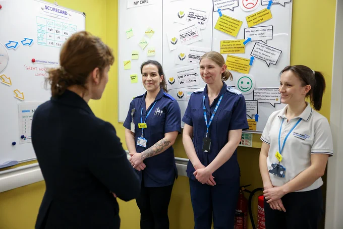 Victoria Atkins talking to clinical staff members at Heatherwood Hospital.