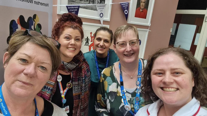 Close up of 5 smiling women from Homerton Healthcare; the CEO, EDI Lead, Women's Network Leads and the Disability Network Lead. 