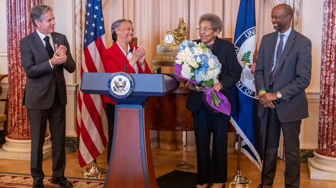 Secretary Blinken and Director General of the Foreign Service and Director of Global Talent Ambassador Marcia Bernicat honor the author, Ambassador Ruth A. Davis, at the celebration of the 50th anniversary of the Thursday Luncheon Group on February 2, 2023. [State Department Photo]