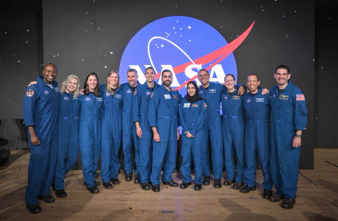 The 2021 Class of Astronauts also known as The Flies pose together during their graduation ceremony at Johnson Space Center in Houston Texas From left are NASA astronauts Andre Douglas Deniz Burnham Christina Birch Nichole Ayers Luke Delaney Marcos Berrios UAE Astronauts Mohammad Al Mulla and Nora Al Matrooshi NASA Astronauts Anil Menon Jessica Wittner Christopher Williams and Jack Hathaway This is the second class to graduate under the Artemis program and the 12 astronauts are now eligible for assignments to the International Space Station Artemis missions to the Moon and ultimately missions to Mars 
Credit NASA Robert Markowitz