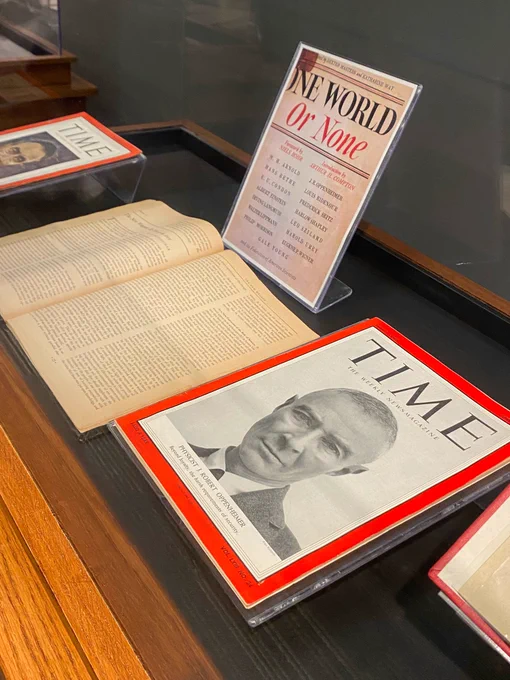 Photo of display case with two Time magazines with Robert Oppenheimer on the cover.