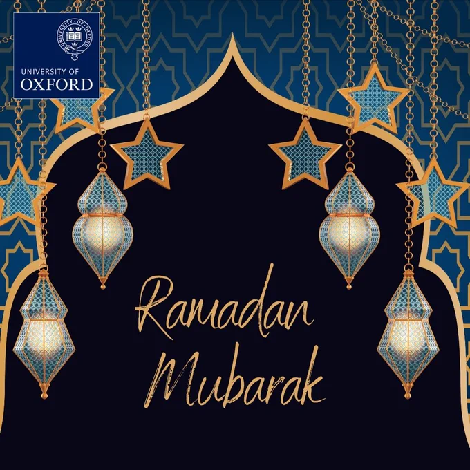 On a black, blue and gold graphic, fanoos and stars decorate the left and right of the image. Text reads: Ramadan Mubarak