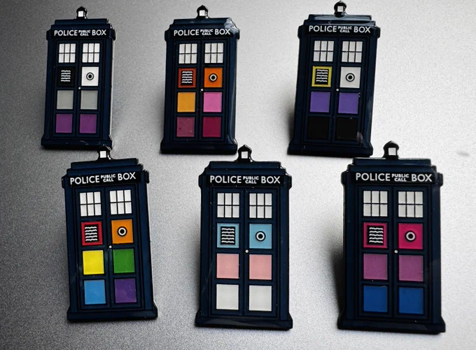 Police Boxes coloured with Pride Flag motifs 