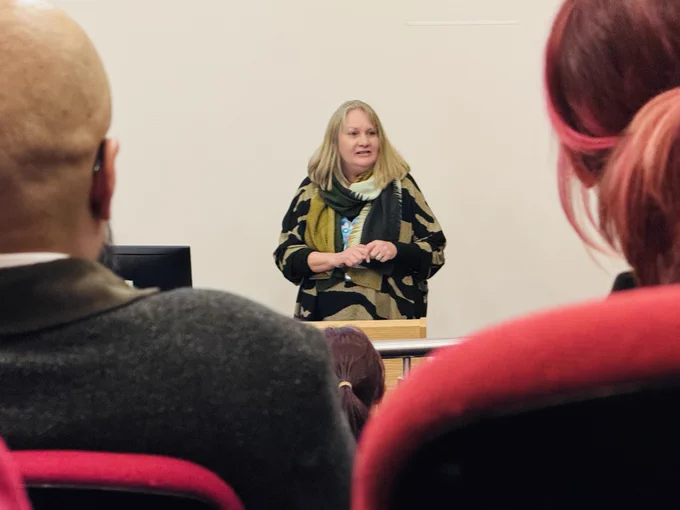 New Chair of the Board, Sarah Jones, speaks to the audience