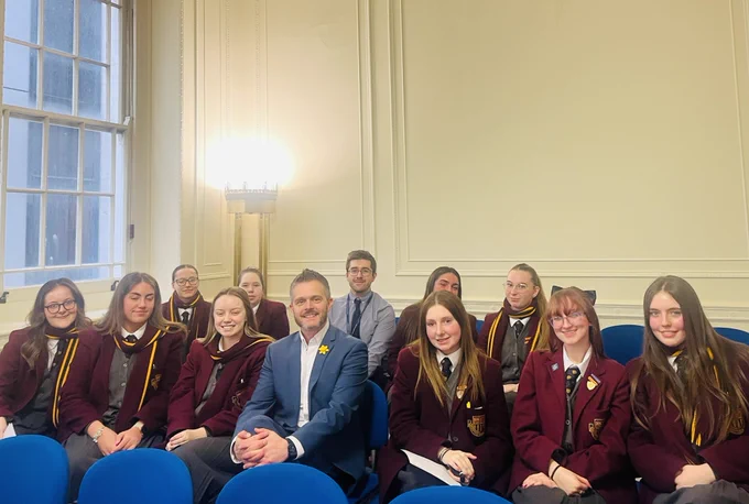 Robbie with students from Girls Model School Belfast and their teacher Mr Savage