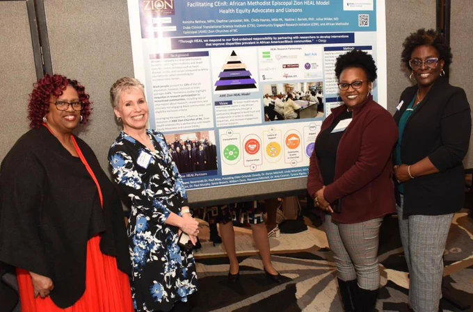 Members of the CERI team with their poster